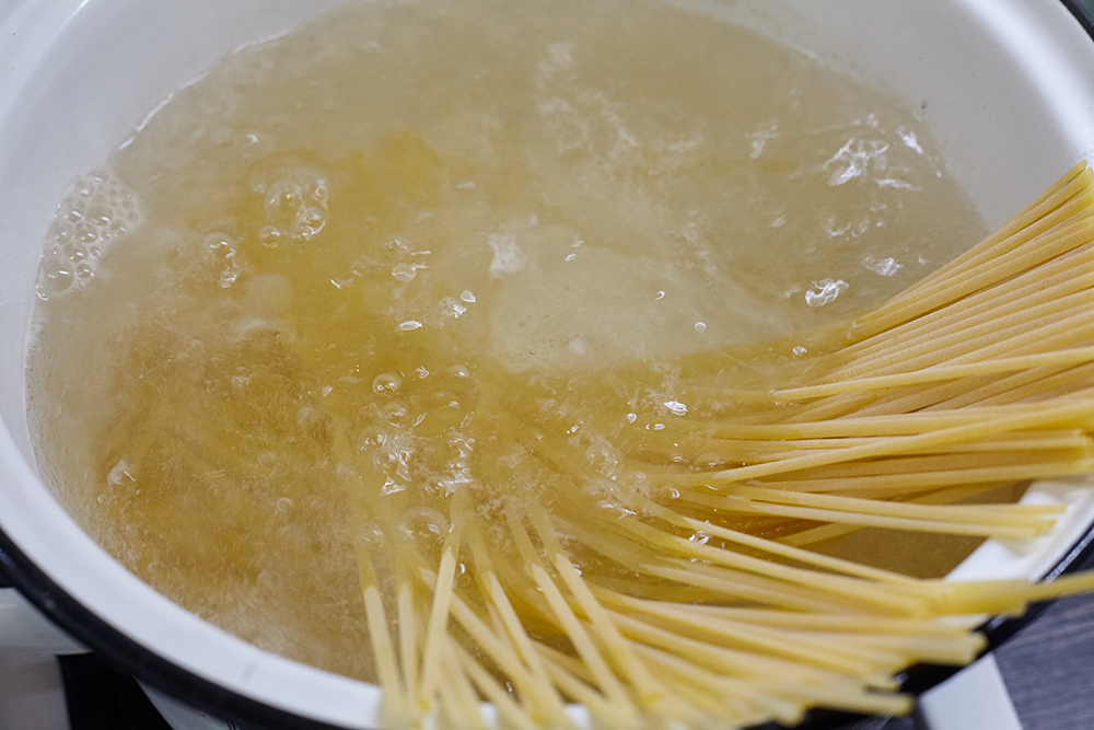 Boil the pasta for pasta with cream mushroom sauce
