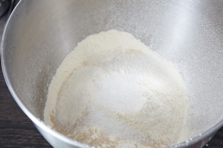 Mix flour, extra yeast, sugar, salt for homemade bread in one hour