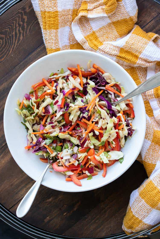 #11 Mexican coleslaw with coriander and lime wedges