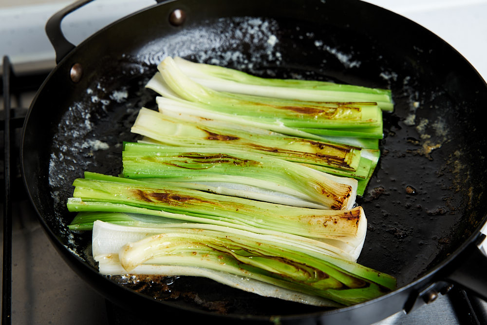 Turn the leeks over and brown the other side