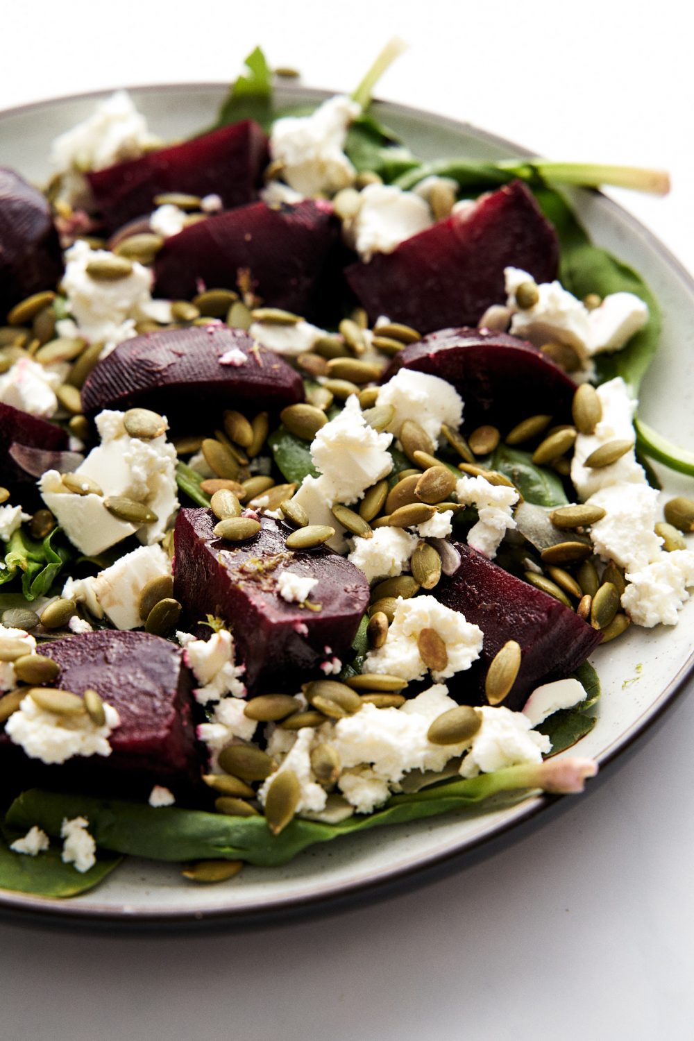 Beet salad with feta and spinach and pumpkin seeds. Step by step recipe with photos