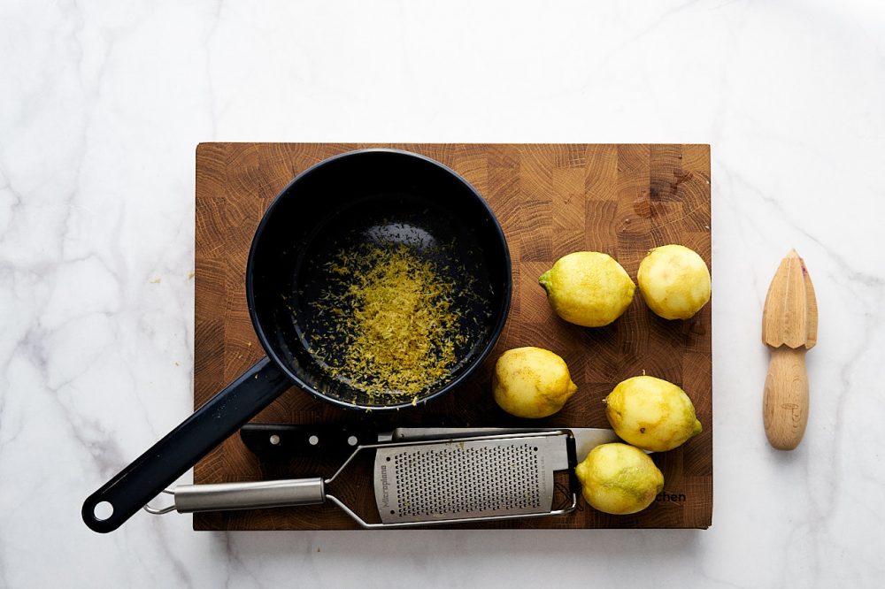 Grate lemon zest for lemon curd