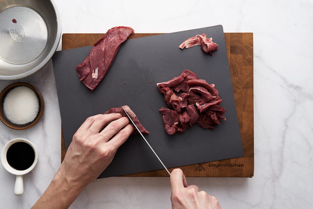 Slice the meat into long thin strips