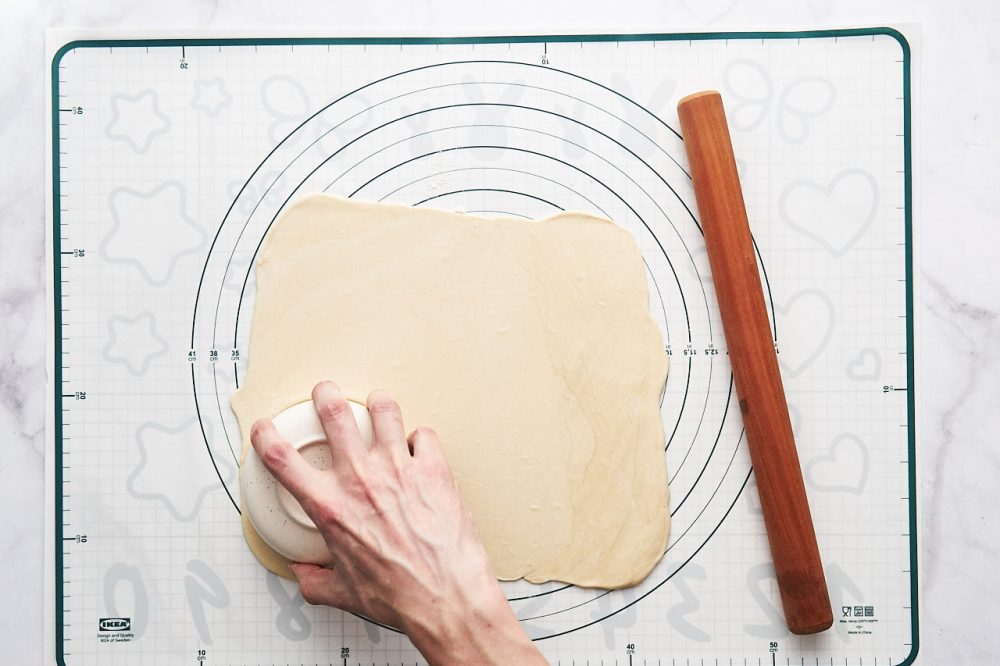 Cut out circles of dough for chicken samosa