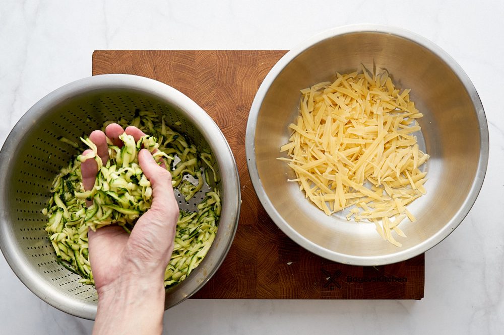 Squeeze the grated zucchini with your hands and add to the cheese