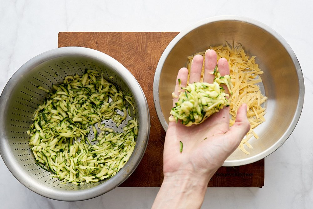 Squeeze the grated zucchini with your hands and add to the cheese
