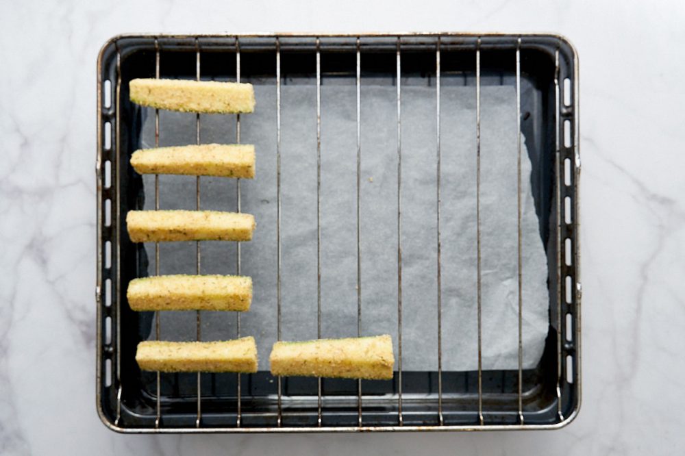 Place the breaded zucchini on a rack
