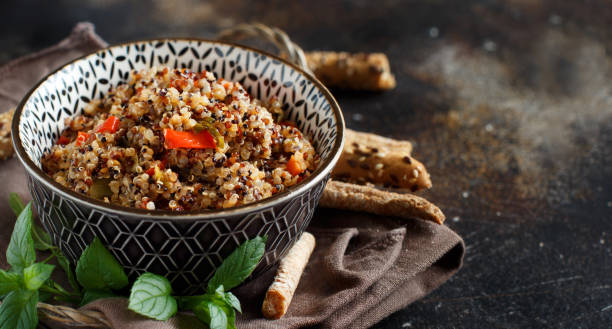 Tri-color quinoa and vegetable stew in a bowl 