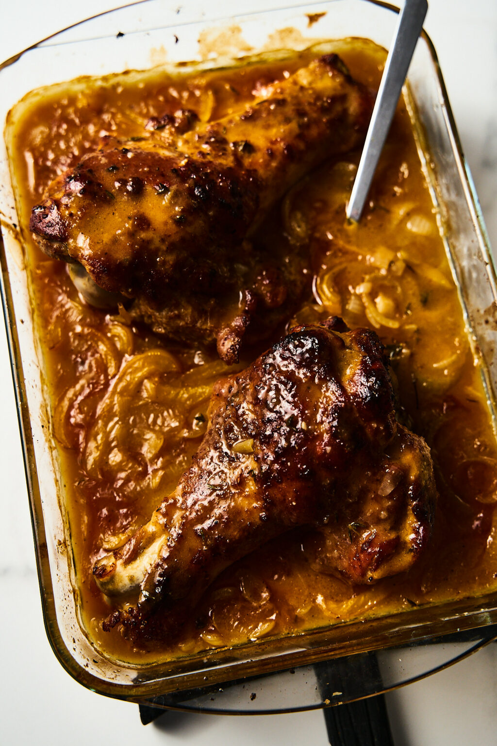 Braised and baked turkey wings in gravy in a baking mold