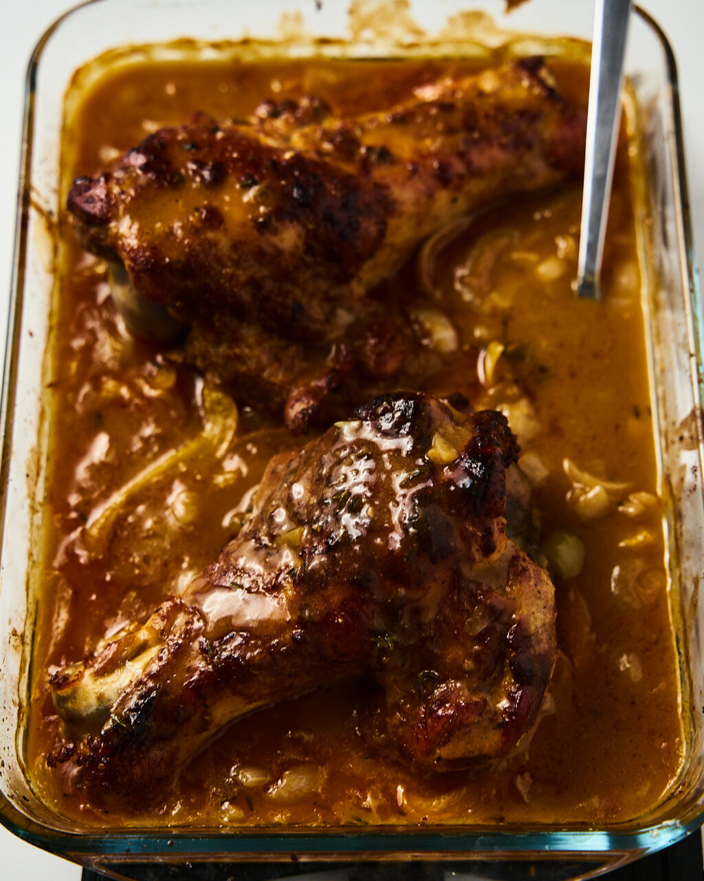 Braised and baked turkey wings in gravy